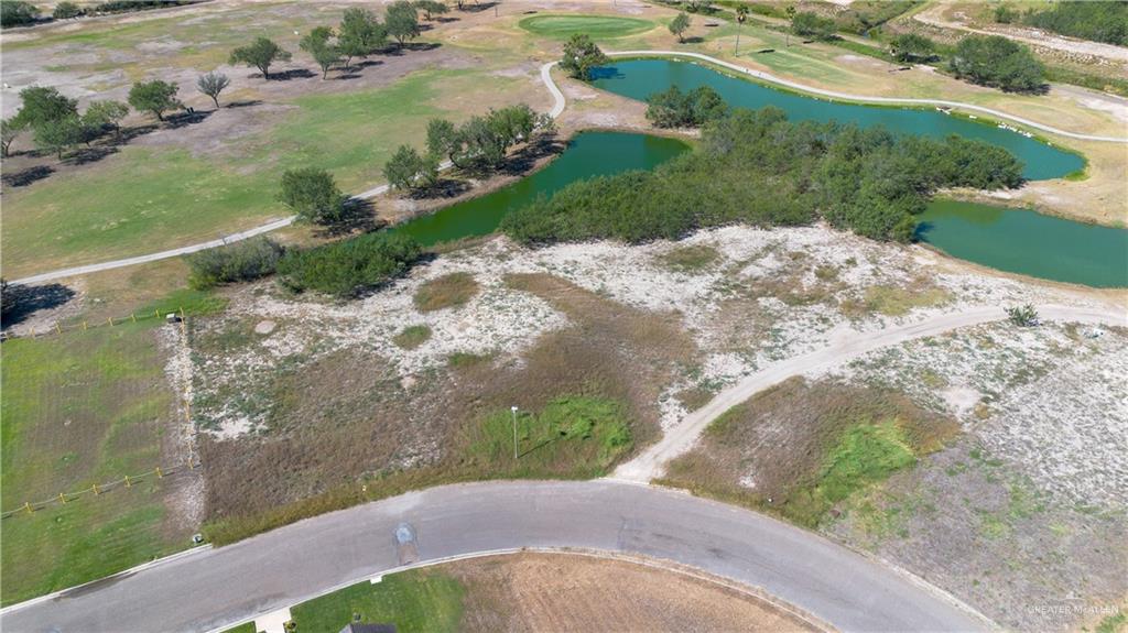 901 Rhett Drive Pharr, TX 78577 - Photo 2 of 5 a view of a lake with a yard