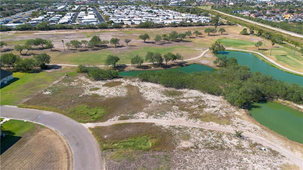 901 Rhett Drive Pharr, TX 78577 - Photo 4 of 5 a view of a lake with a city