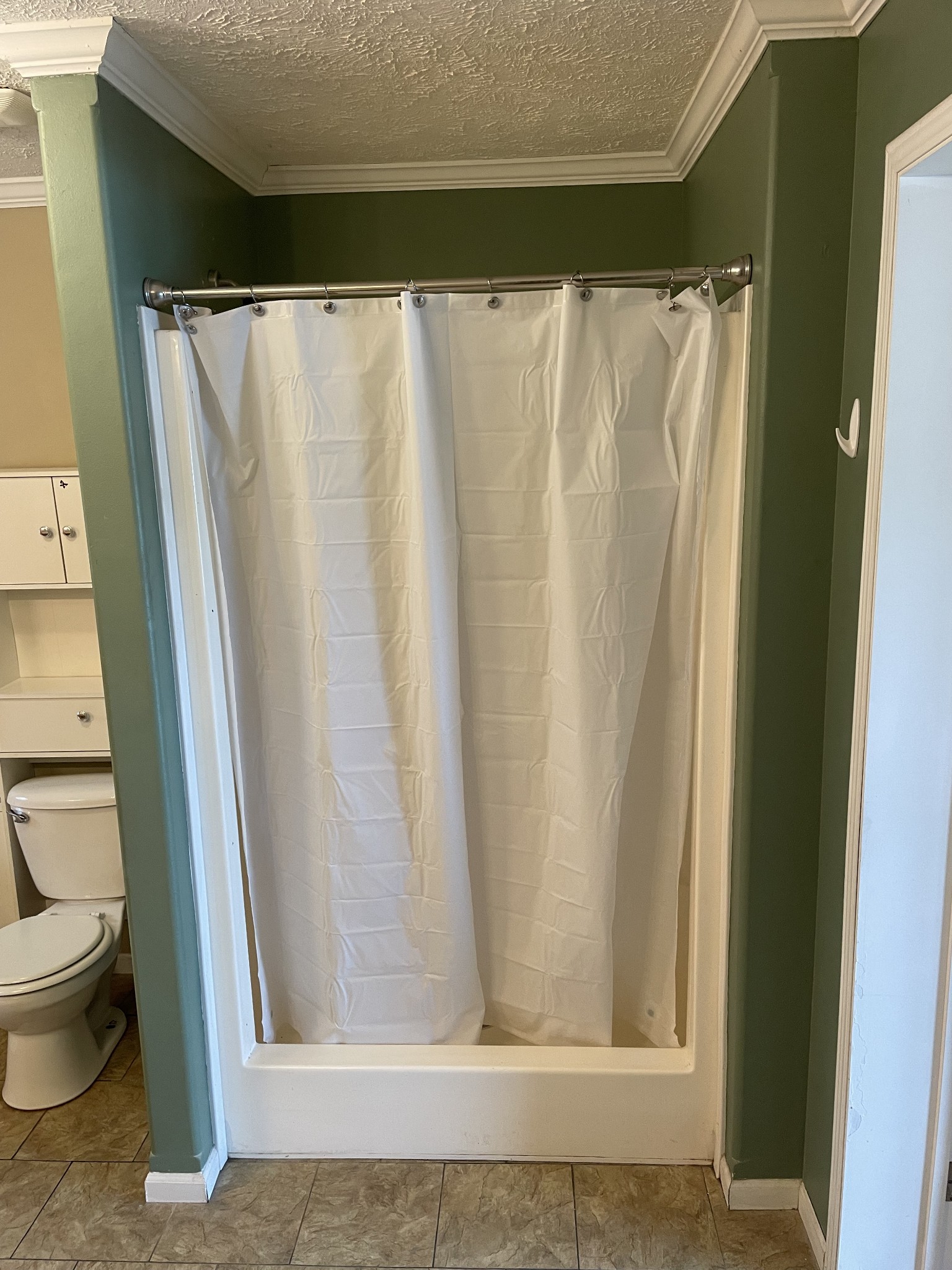 379 Dady Road McEwen, TN 37101 - Photo 28 of 34 a bathroom with a shower and a toilet