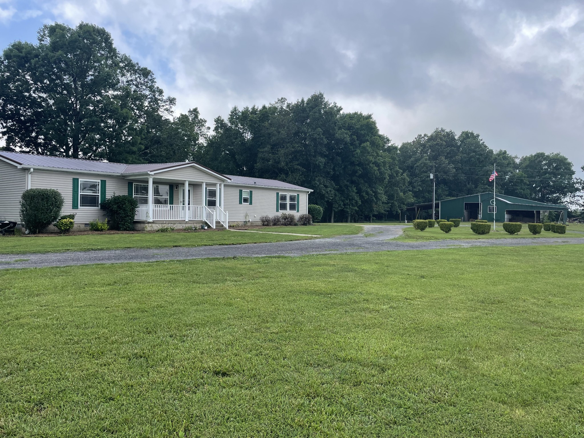 379 Dady Road McEwen, TN 37101 - Photo 10 of 34 a house view with a garden space