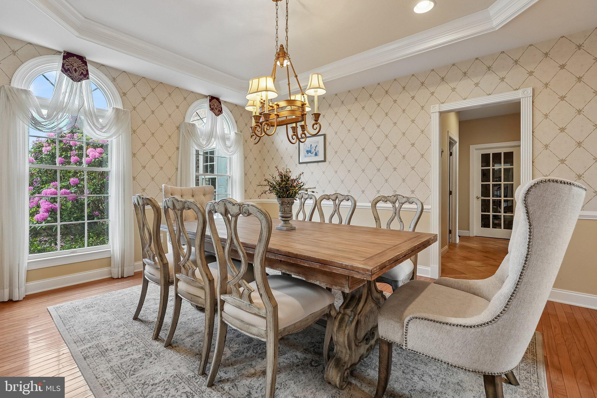 1 Baker Way Pennington, NJ 08534 - Photo 10 of 77 a dining room with furniture a chandelier and wooden floor