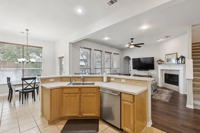 a view of yard with swimming pool and trees