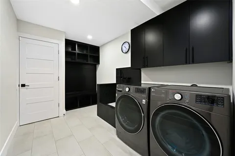 a view of a storage & utility room with washer and dryer