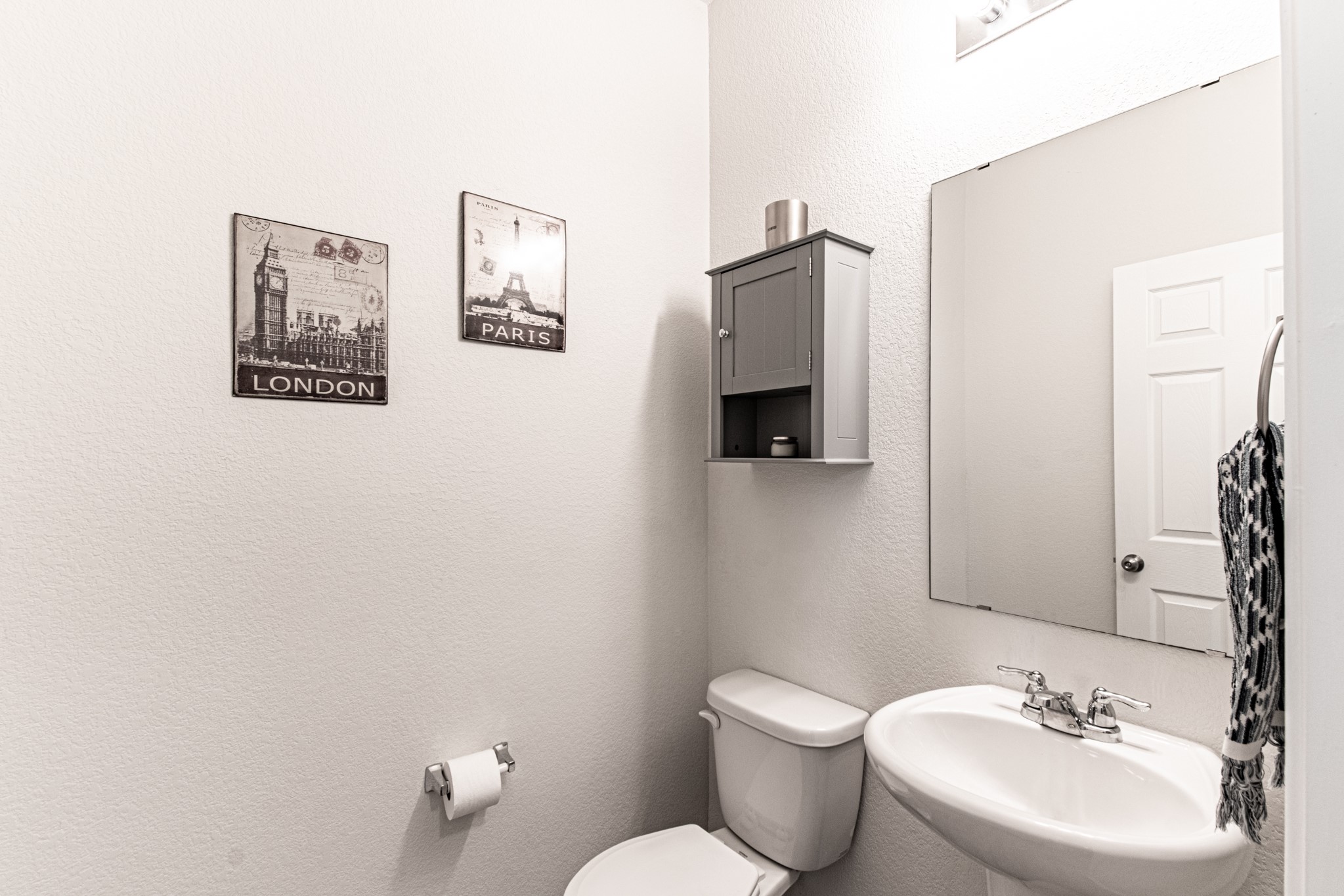 192 Spotted Rail Ridge Leander, TX 78641 - Photo 8 of 34 a bathroom with a toilet sink and mirror