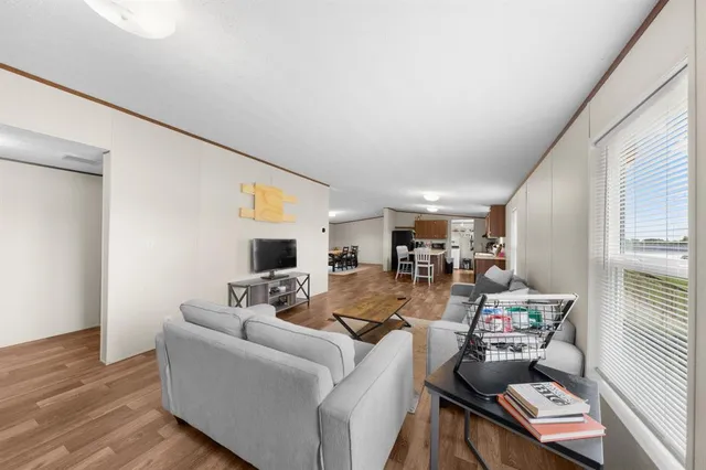 a view of a kitchen and dining room