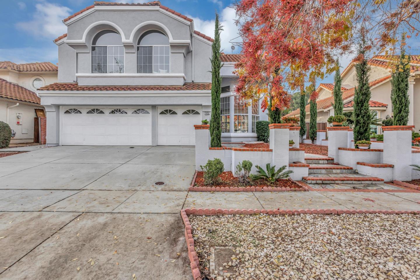 1173 Eagle Ridge Way Milpitas, CA 95035 - Photo 1 of 30 a front view of a house with garden