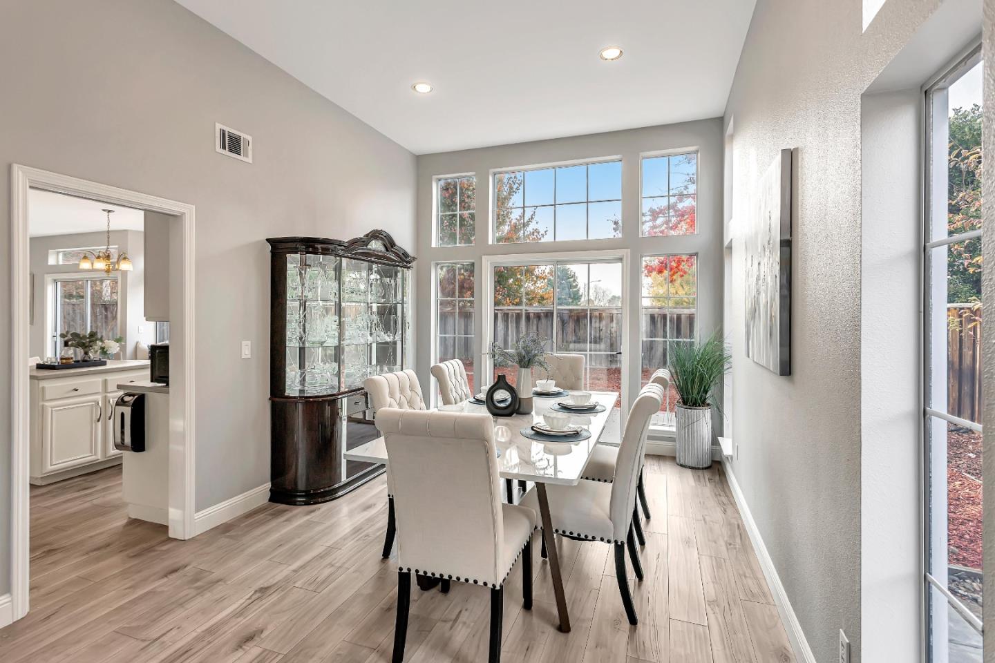 1173 Eagle Ridge Way Milpitas, CA 95035 - Photo 13 of 30 a view of a dining room with furniture and wooden floor