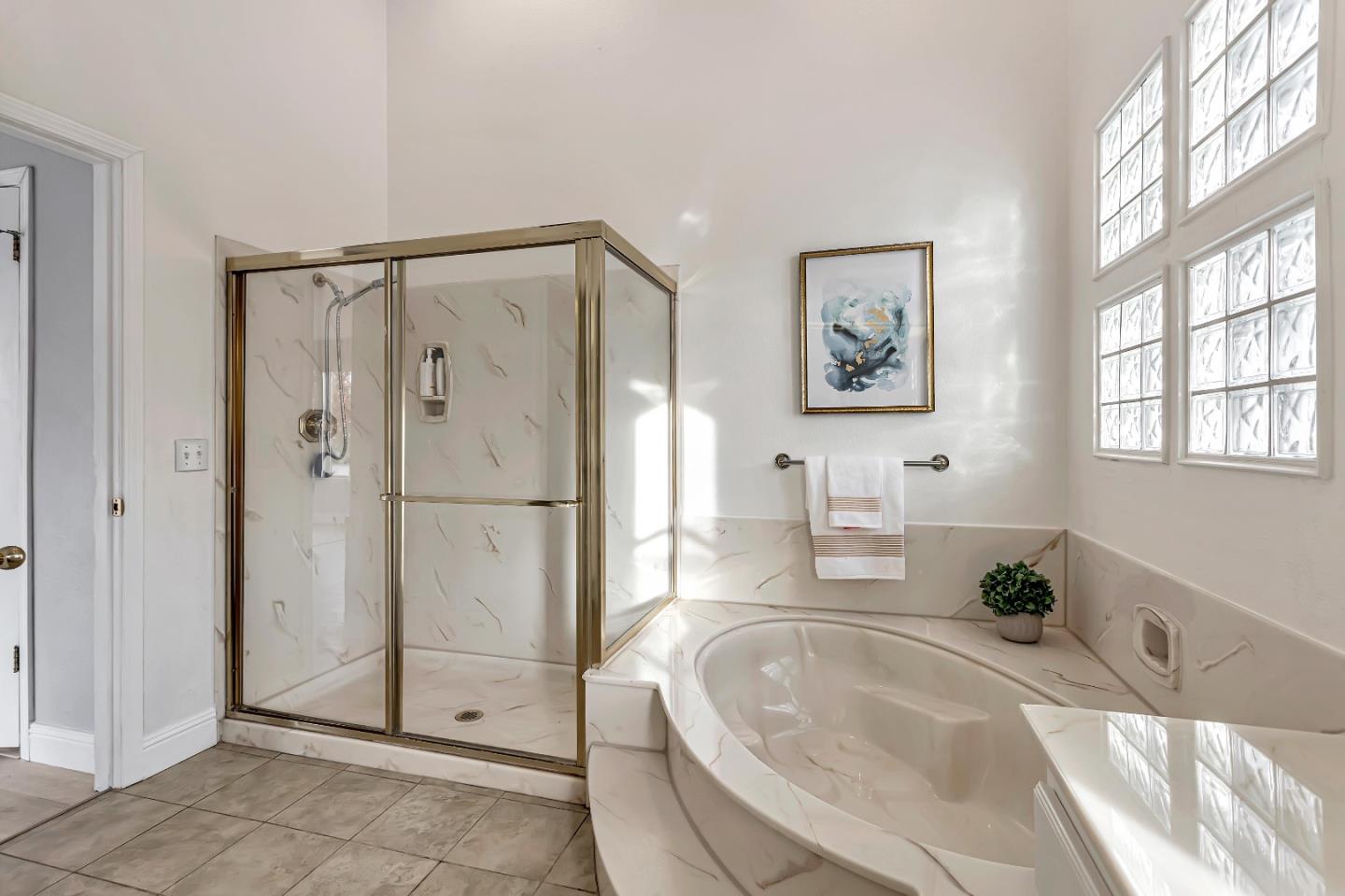 1173 Eagle Ridge Way Milpitas, CA 95035 - Photo 20 of 30 a bathroom with a tub a sink and a shower