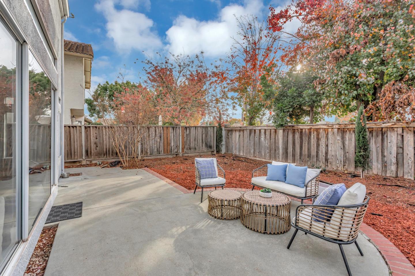 1173 Eagle Ridge Way Milpitas, CA 95035 - Photo 28 of 30 a backyard of a house with table and chairs