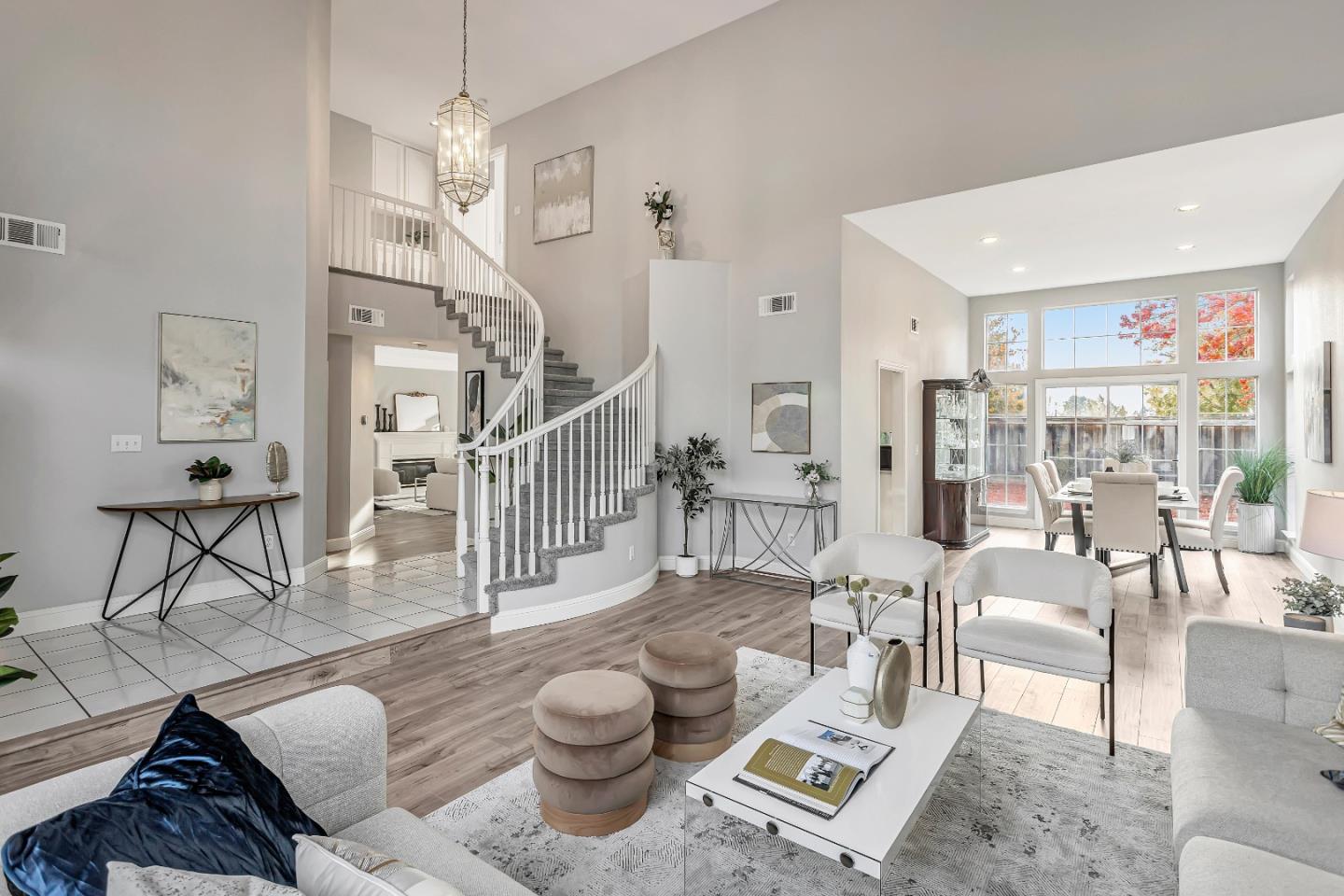 1173 Eagle Ridge Way Milpitas, CA 95035 - Photo 4 of 30 a living room with furniture and a chandelier