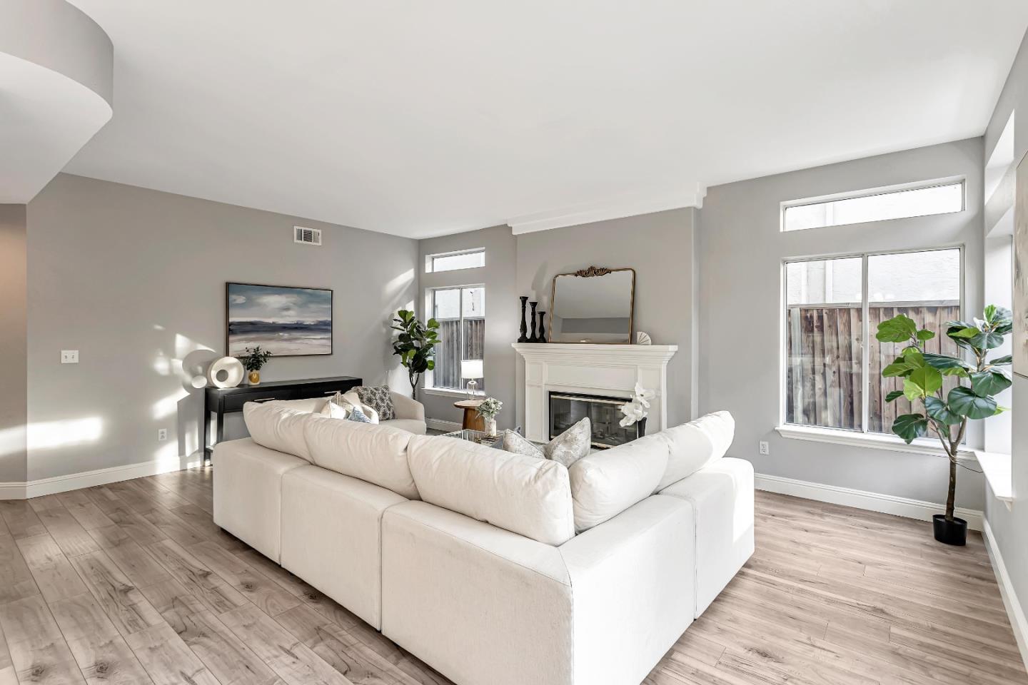 1173 Eagle Ridge Way Milpitas, CA 95035 - Photo 7 of 30 a living room with furniture and a fireplace