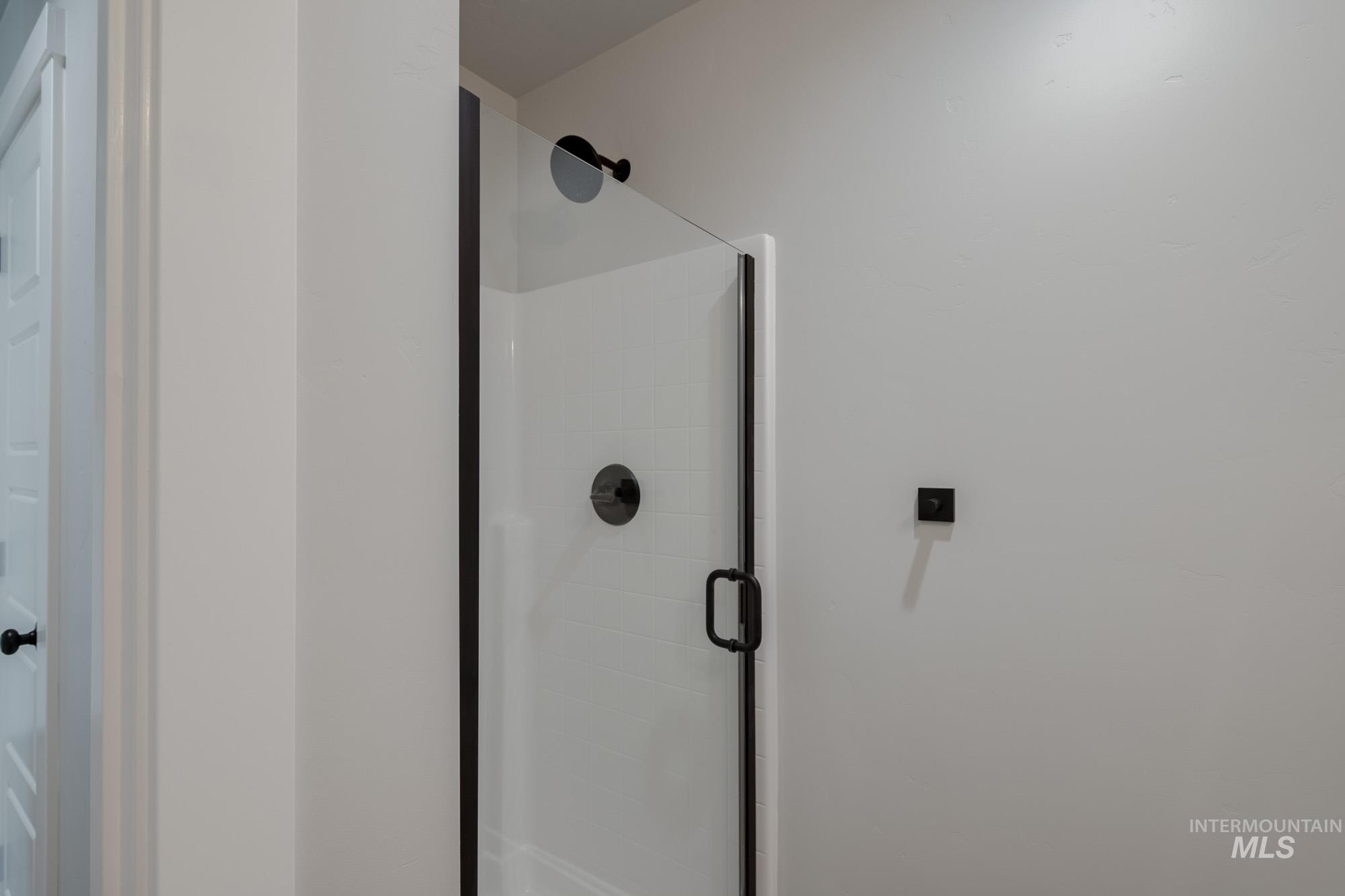 3304 West Morere Drive Meridian, ID 83642 - Photo 16 of 28 Full bath featuring a shower stall