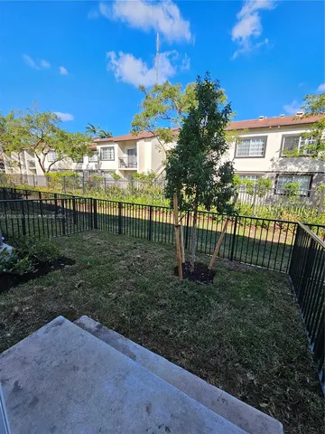 a view of a garden with a small yard