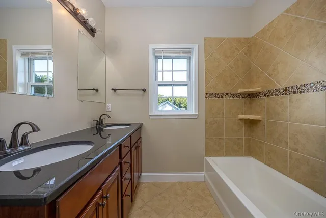 a bathroom with a sink and a bathtub