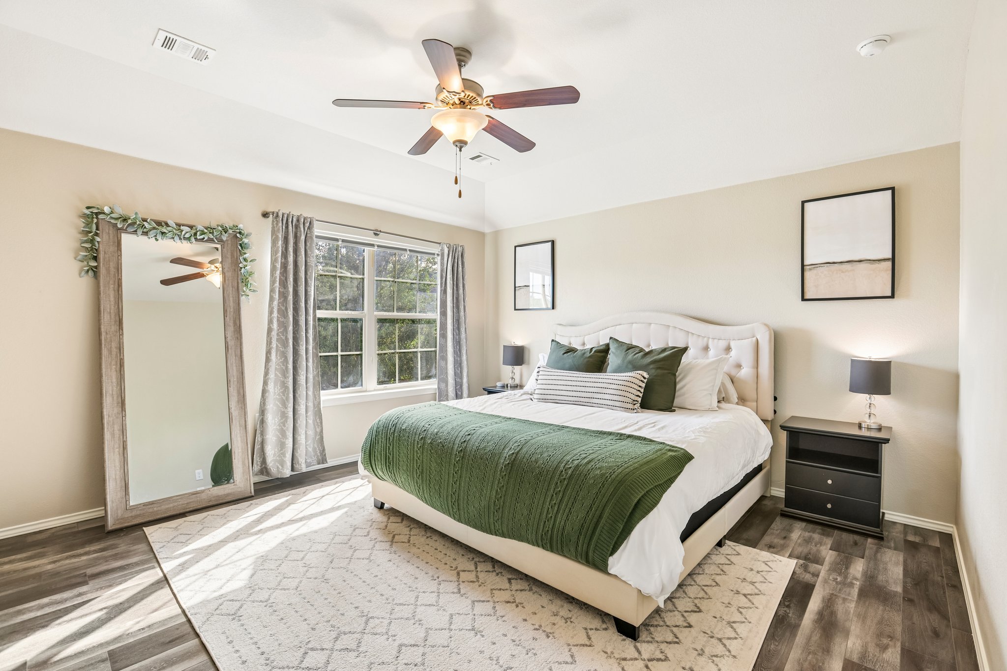 5508 Emma Thompson Way Austin, TX 78747 - Photo 22 of 34 The generously sized primary bedroom is filled with natural light and offers plenty of space to create your ideal retreat.