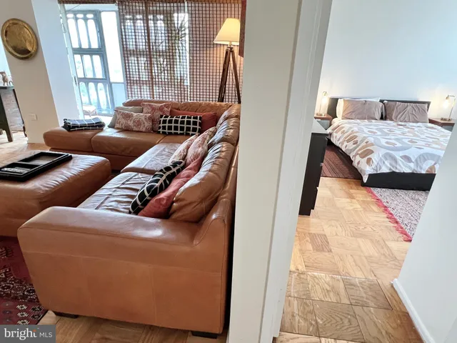 a living room with furniture and a window