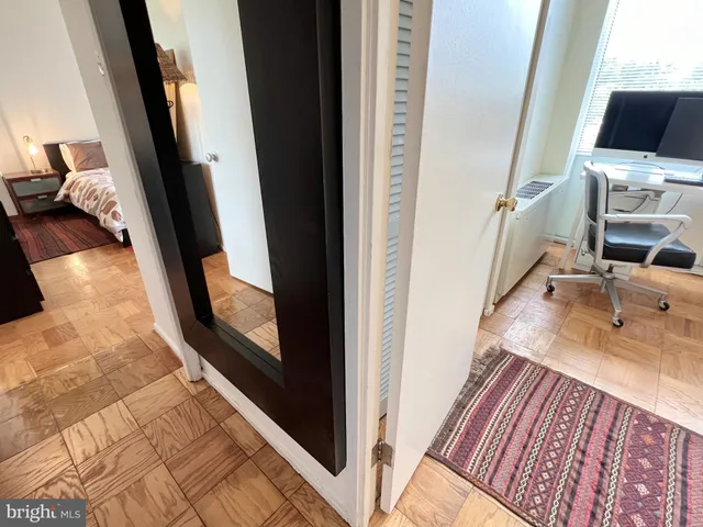 a view of a living room and front door