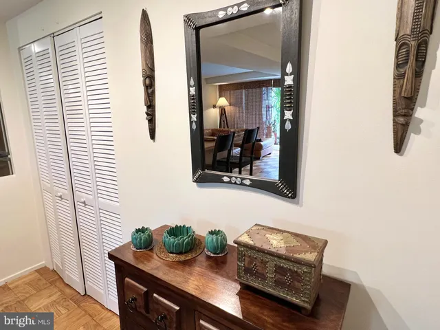 a view of front door with wooden floor