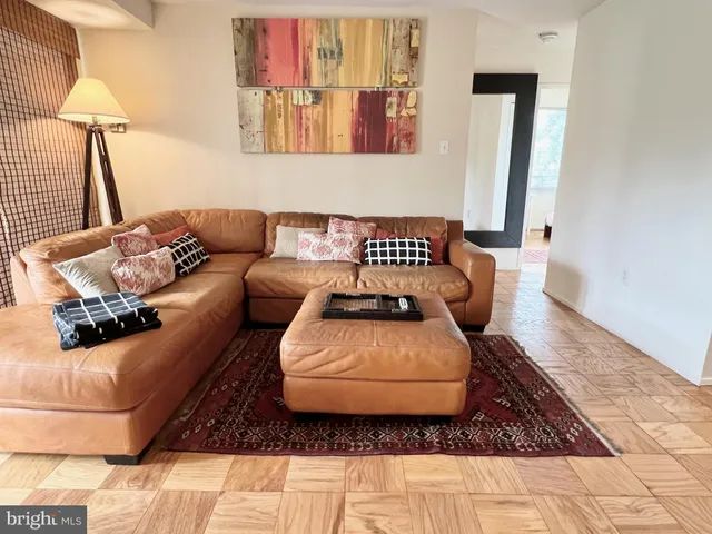 a living room with furniture and a couch