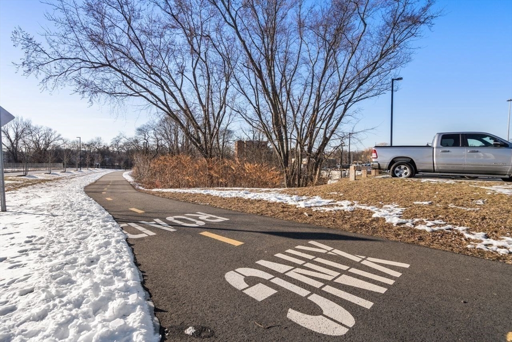 4 Stratton Drive, Unit 308 Woburn, MA 01801 - Photo 24 of 24 a view of road with trees