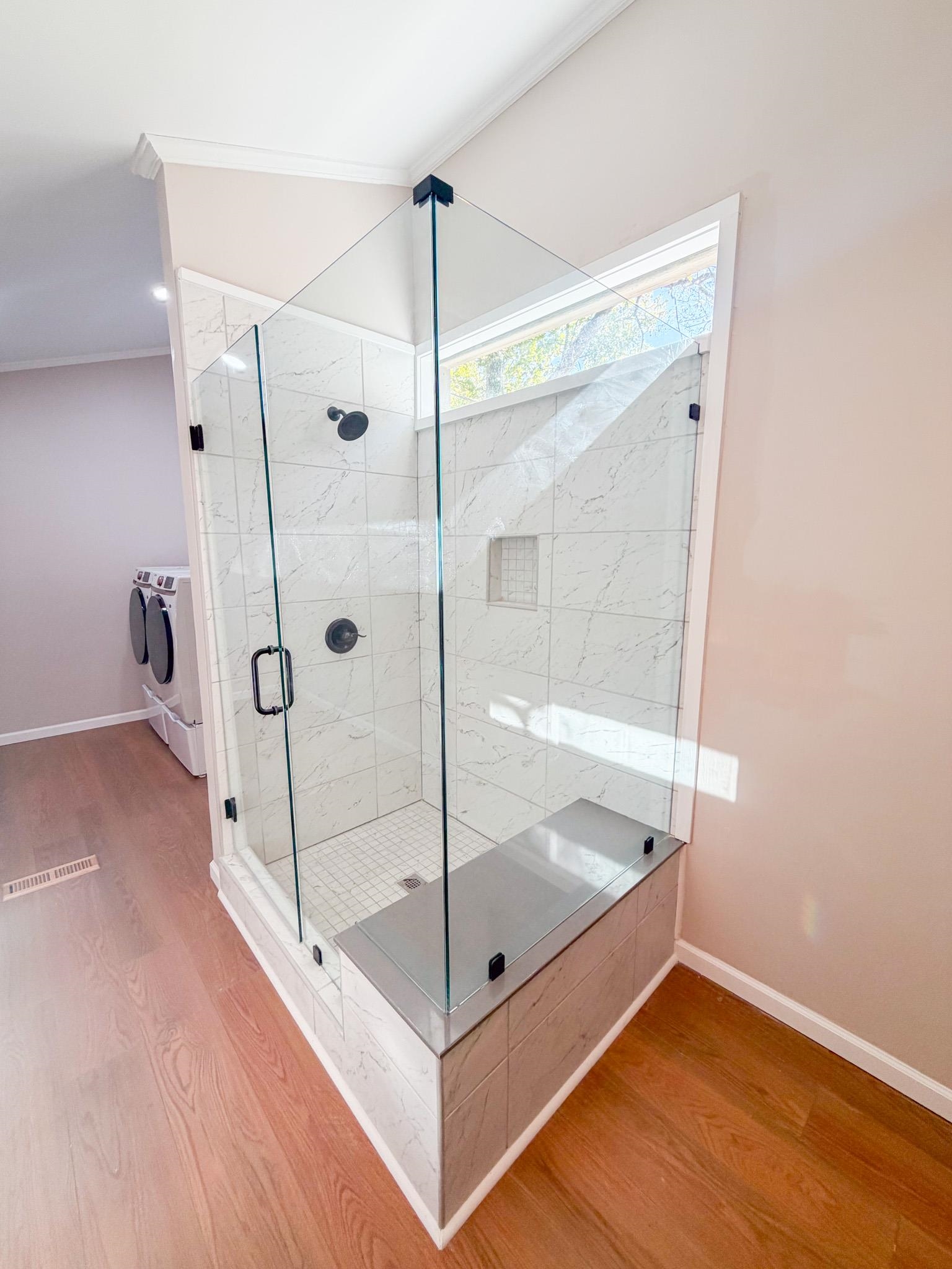 905 Cr 956 Road Iuka, MS 38852 - Photo 11 of 16 a bathroom with a glass shower door