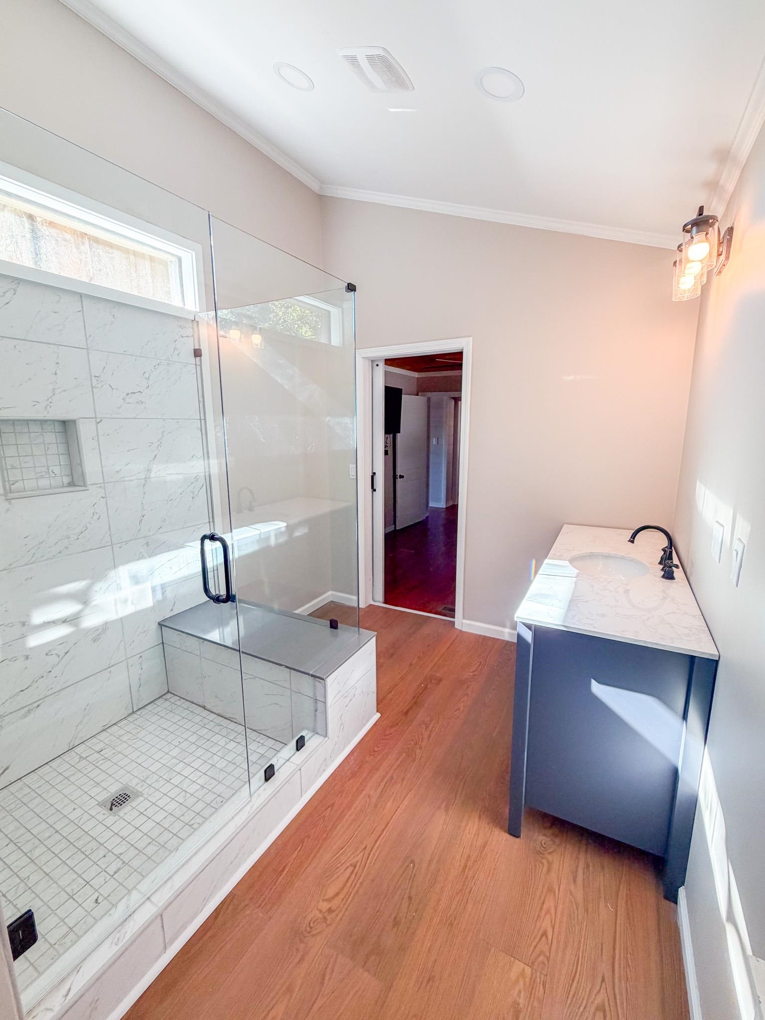 905 Cr 956 Road Iuka, MS 38852 - Photo 12 of 16 a bathroom with a tub sink and mirror