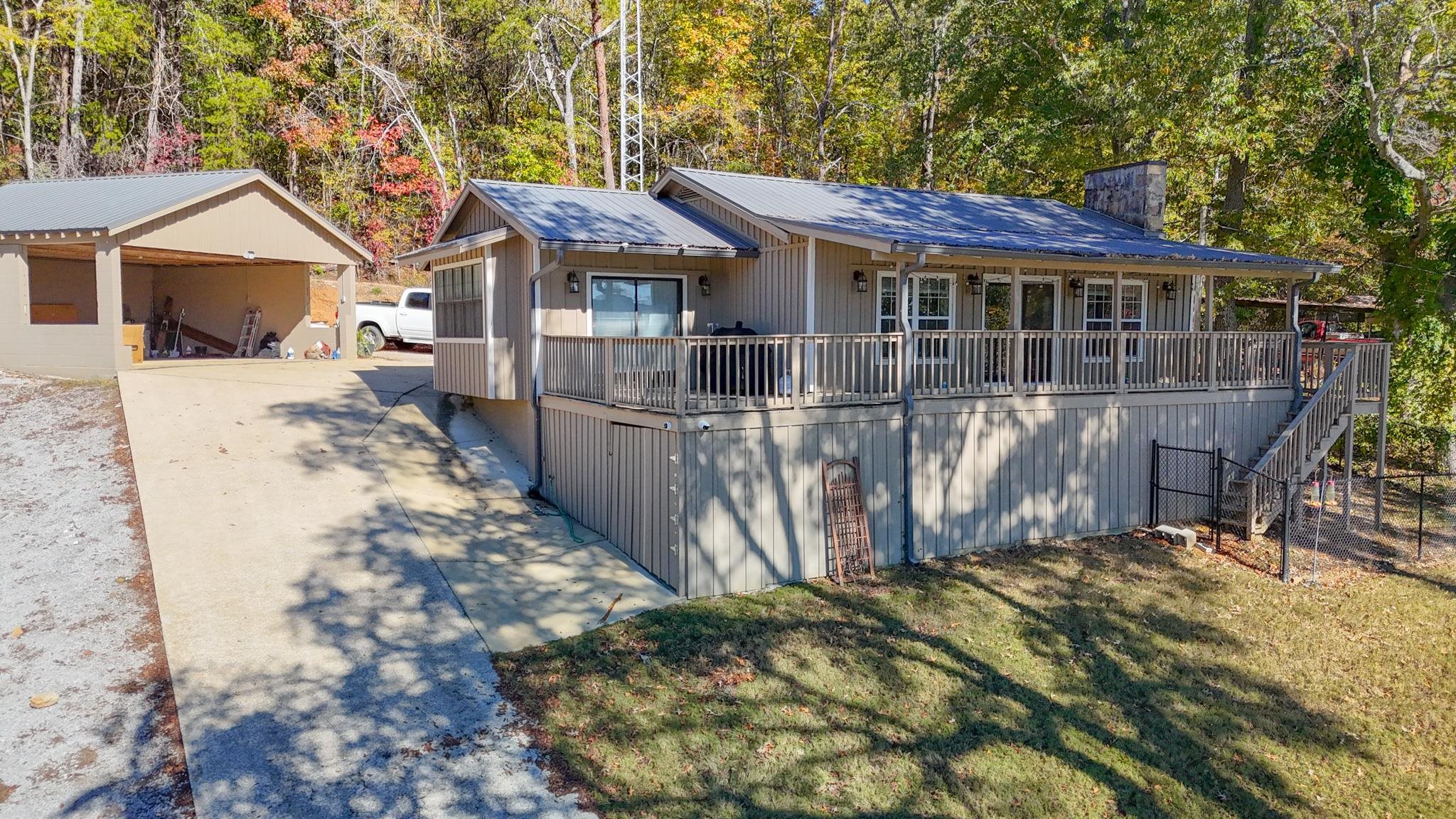 905 Cr 956 Road Iuka, MS 38852 - Photo 2 of 16 a view of a house with wooden fence