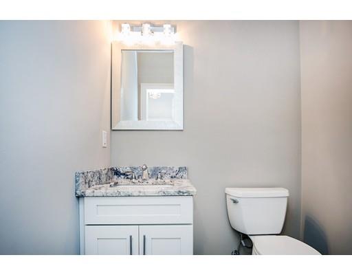 10 Old Cart Path Norfolk, MA 02056 - Photo 12 of 23 a bathroom with a toilet sink and mirror