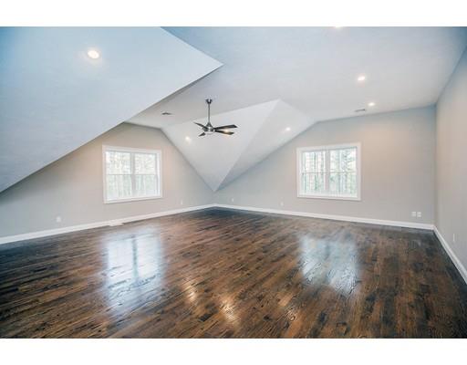 10 Old Cart Path Norfolk, MA 02056 - Photo 13 of 23 a view of an empty room with wooden floor and a window
