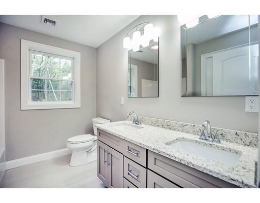 10 Old Cart Path Norfolk, MA 02056 - Photo 15 of 23 a bathroom with a granite countertop sink a toilet and a mirror
