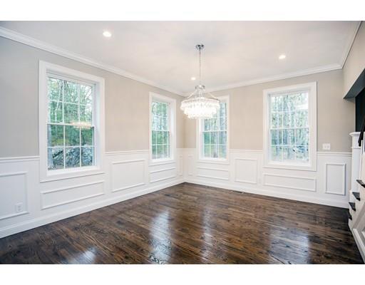 10 Old Cart Path Norfolk, MA 02056 - Photo 16 of 23 an empty room with wooden floor and windows