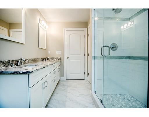 10 Old Cart Path Norfolk, MA 02056 - Photo 17 of 23 a bathroom with a granite countertop sink mirror and shower