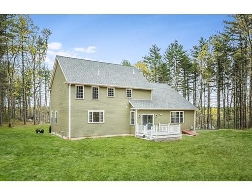 10 Old Cart Path Norfolk, MA 02056 - Photo 2 of 23 a front view of a house with a yard