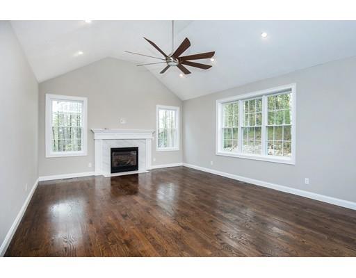10 Old Cart Path Norfolk, MA 02056 - Photo 23 of 23 a view of empty room with wooden floor and fan