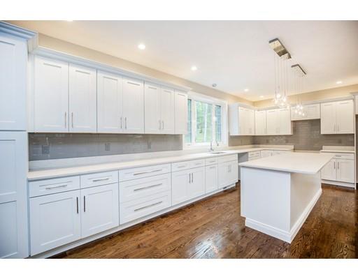 10 Old Cart Path Norfolk, MA 02056 - Photo 7 of 23 a kitchen with white cabinets