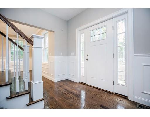 10 Old Cart Path Norfolk, MA 02056 - Photo 10 of 23 an empty room with wooden floor and windows