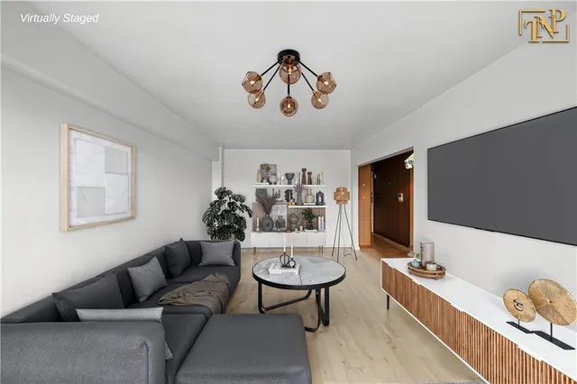 a living room with furniture and a table