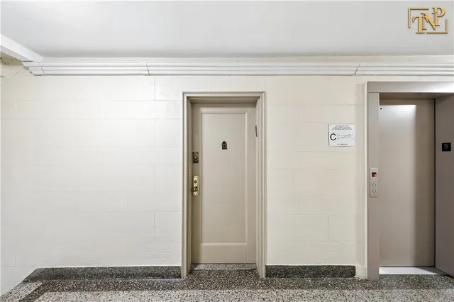 front view of a building with a yard