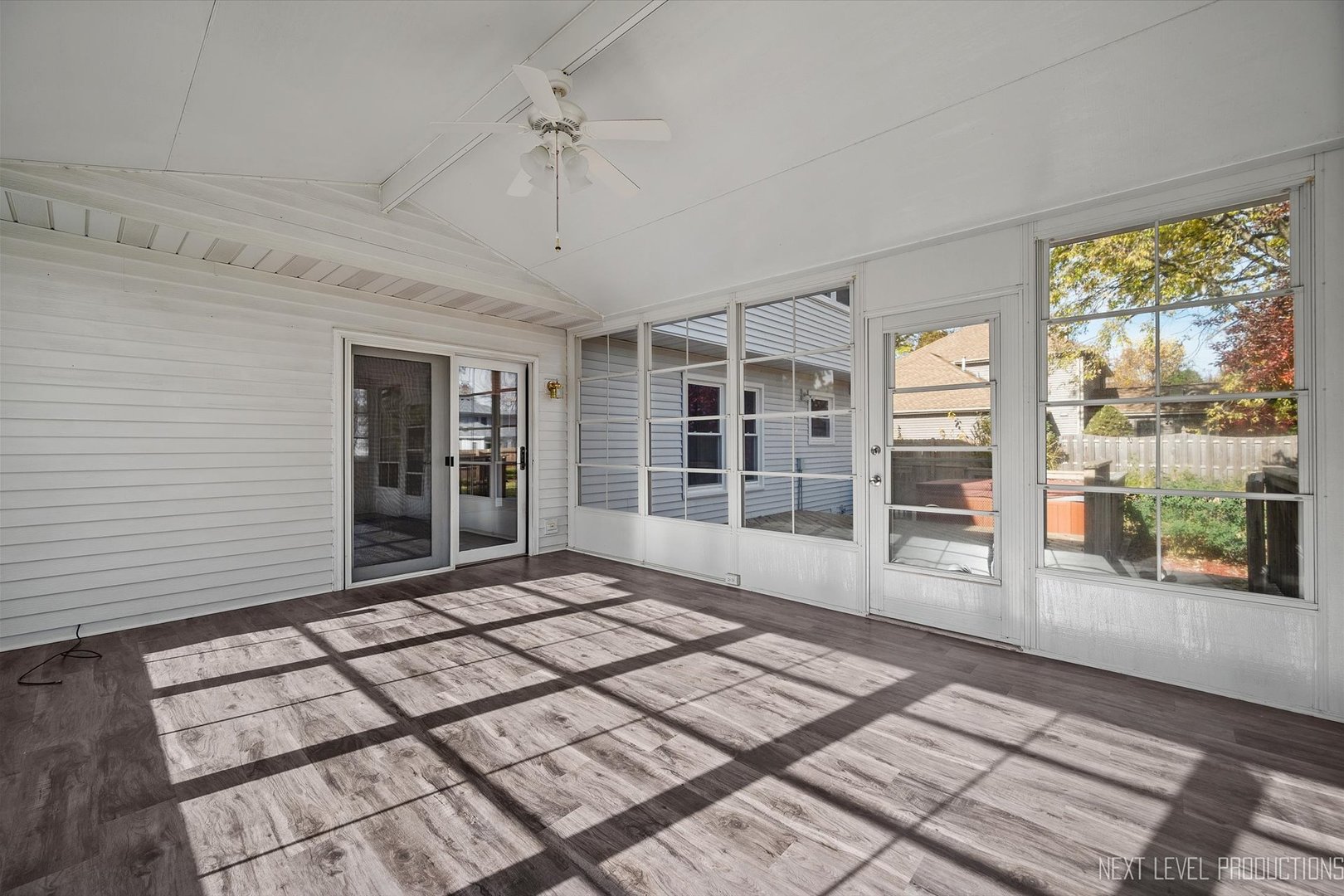 231 North Cambridge Drive Geneva, IL 60134 - Photo 16 of 34 a view of an empty room with a window