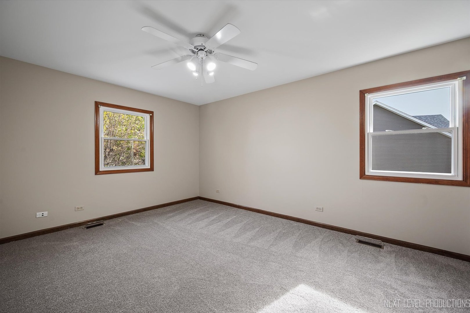 231 North Cambridge Drive Geneva, IL 60134 - Photo 27 of 34 a view of an empty room with a window