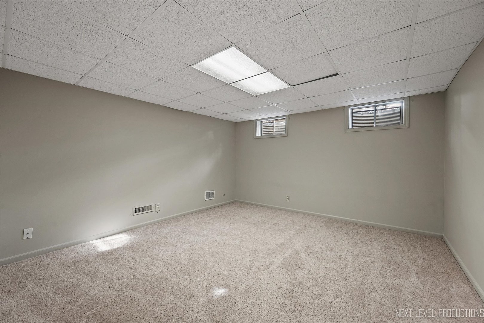 231 North Cambridge Drive Geneva, IL 60134 - Photo 31 of 34 an empty room with a empty space and windows