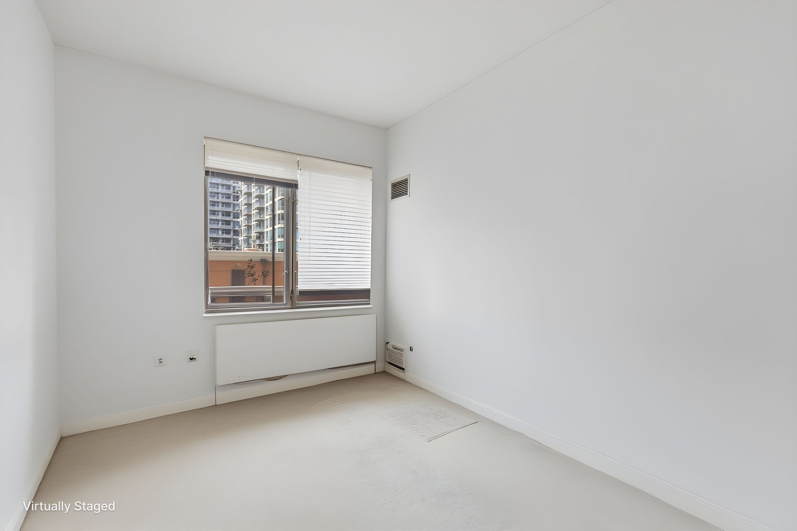 1322 South Prairie Avenue, Unit 405 Chicago, IL 60605 - Photo 11 of 22 a view of an empty room with a window