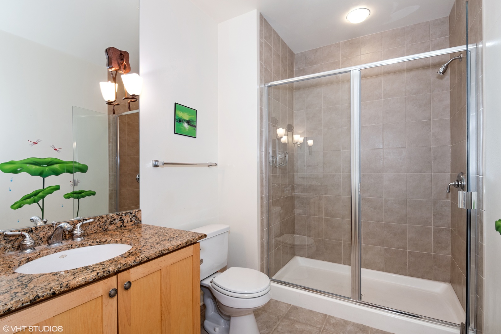 1322 South Prairie Avenue, Unit 405 Chicago, IL 60605 - Photo 12 of 22 a bathroom with a granite countertop sink toilet and shower