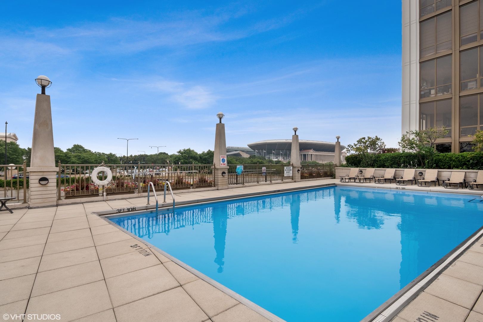 1322 South Prairie Avenue, Unit 405 Chicago, IL 60605 - Photo 21 of 22 a swimming pool with outdoor seating and yard