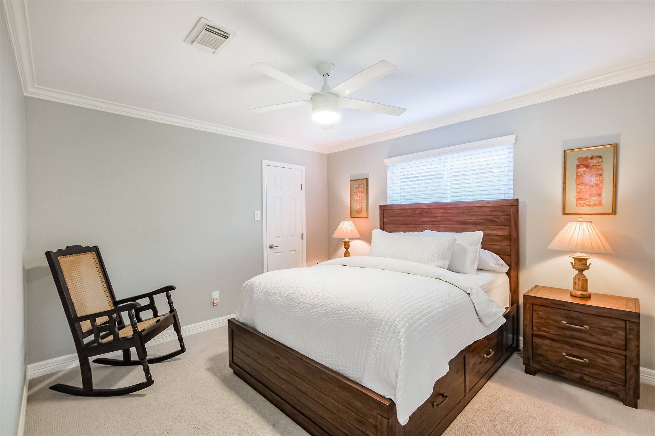 1007 Arrow Hill Road Houston, TX 77077 - Photo 33 of 48 The third bedroom has carpet floors, crown molding, walk-in closet and an updated ceiling fan.
