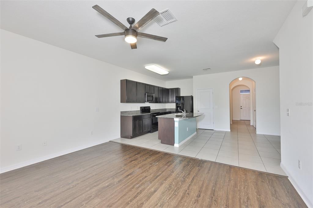 8969 Indigo Trail Loop Riverview, FL 33578 - Photo 13 of 41 a view of kitchen with sink microwave and cabinets