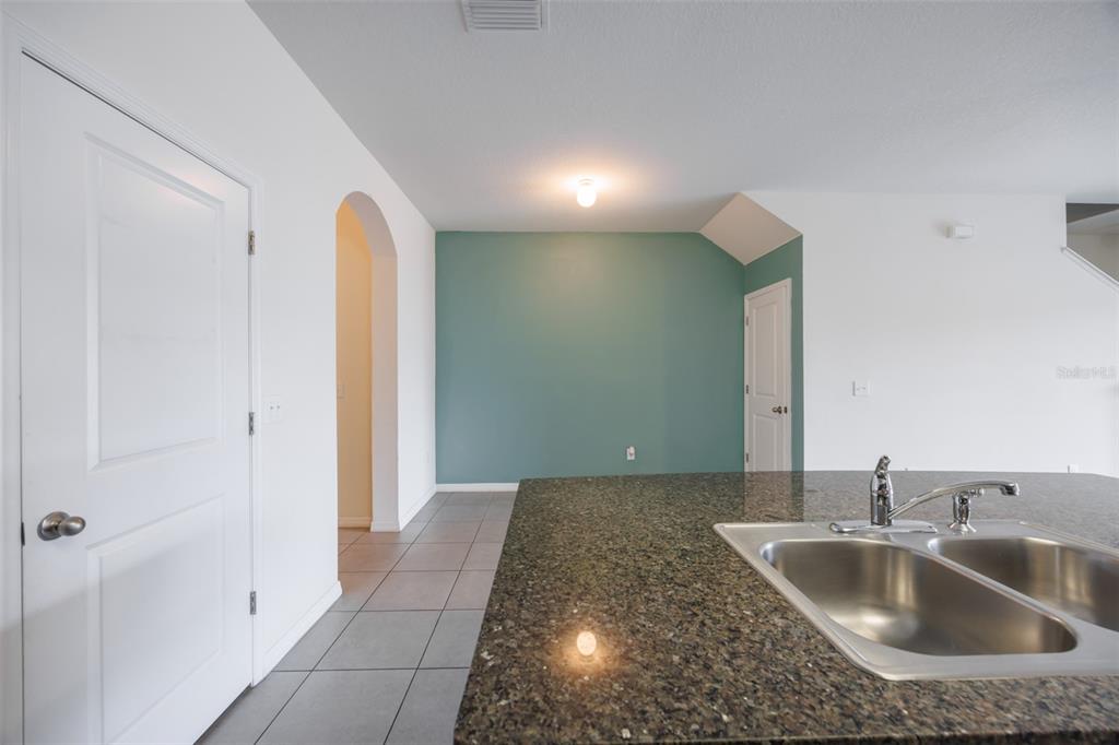 8969 Indigo Trail Loop Riverview, FL 33578 - Photo 19 of 41 a kitchen with a sink and a tub