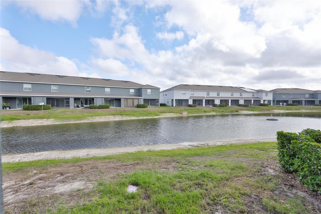 8969 Indigo Trail Loop Riverview, FL 33578 - Photo 21 of 41 a view of a swimming pool and a lake view