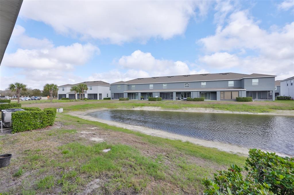 8969 Indigo Trail Loop Riverview, FL 33578 - Photo 22 of 41 a view of big yard with a large trees