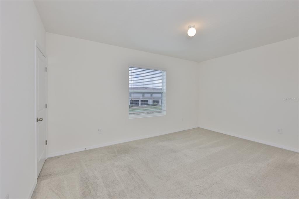 8969 Indigo Trail Loop Riverview, FL 33578 - Photo 23 of 41 an empty room with a window